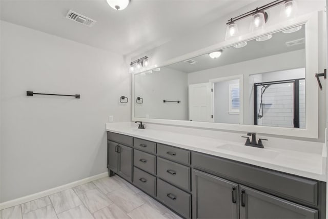 bathroom with vanity and walk in shower