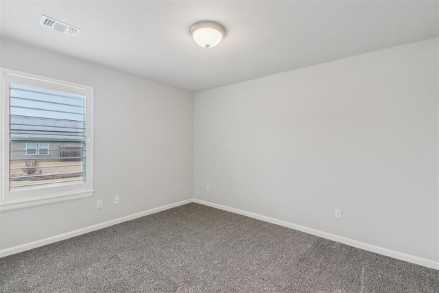 unfurnished room with carpet