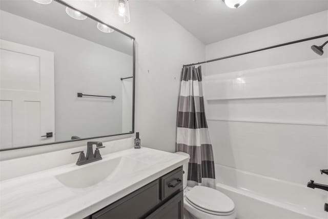 full bathroom featuring vanity, toilet, and shower / bath combo with shower curtain