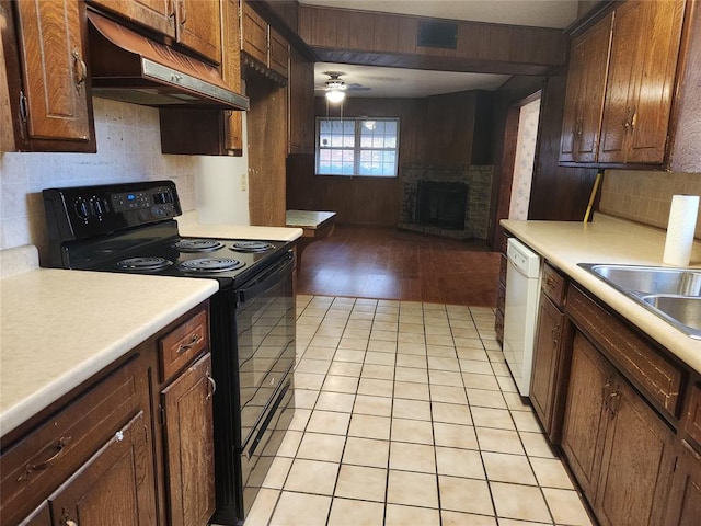 kitchen with dishwasher, black electric range, decorative backsplash, ceiling fan, and light hardwood / wood-style floors