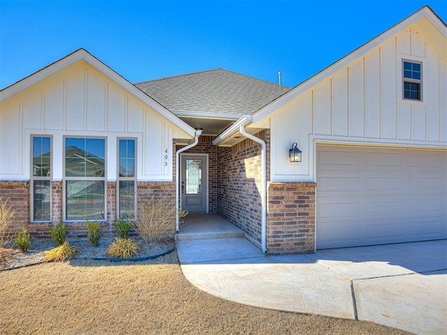 view of exterior entry with a garage