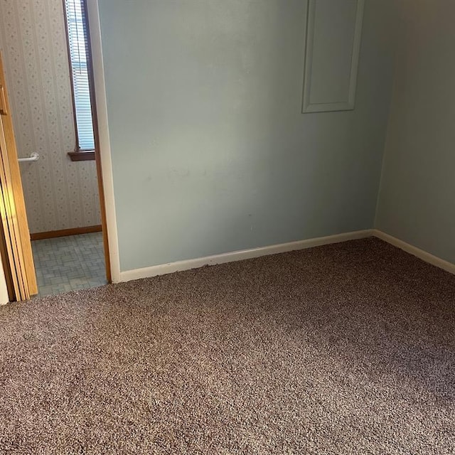 unfurnished room with carpet