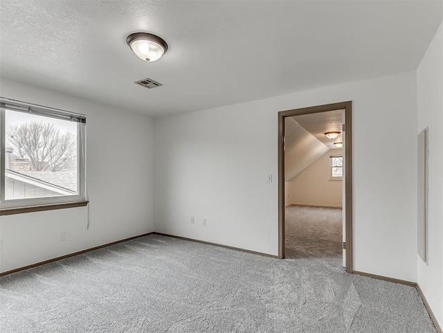 6404 Westway, Oklahoma City, OK 73142 - carpeted spare room featuring baseboards