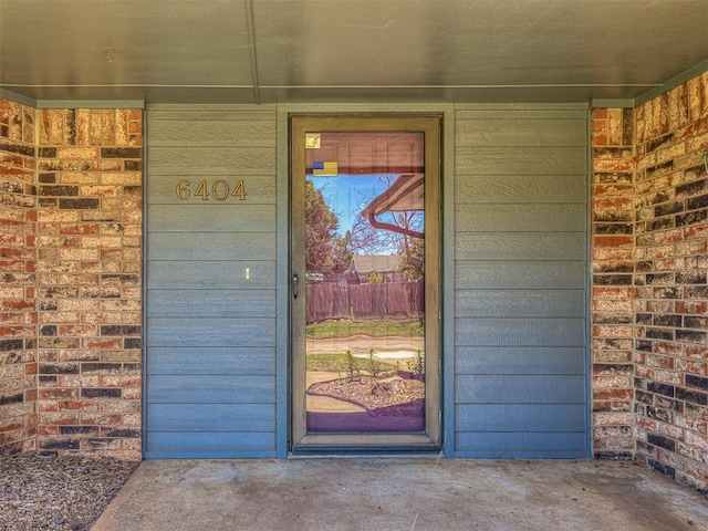 6404 Westway, Oklahoma City, OK 73142 - view of exterior entry featuring brick siding