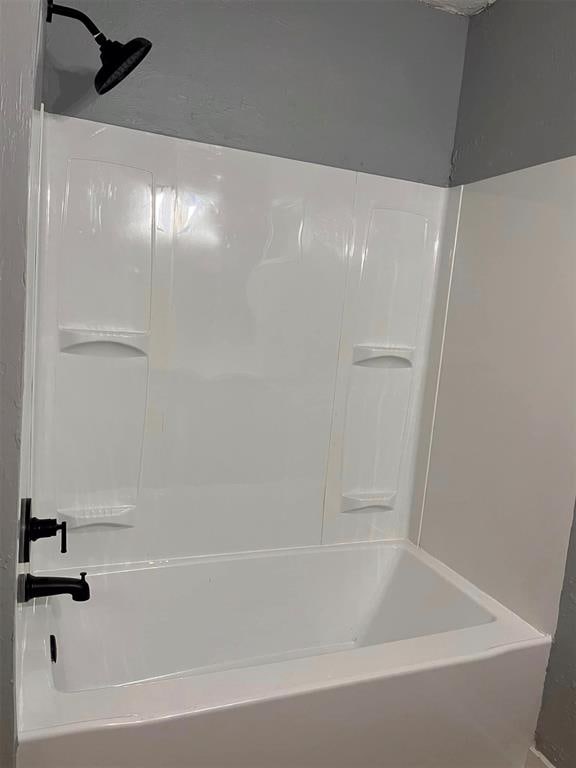 bathroom featuring shower / tub combination