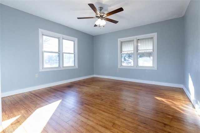 unfurnished room with ceiling fan and light hardwood / wood-style floors