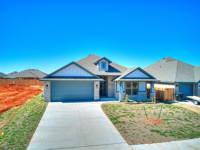 view of front facade with a garage and a front lawn