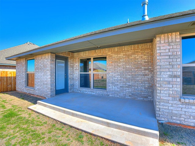 rear view of house featuring a patio