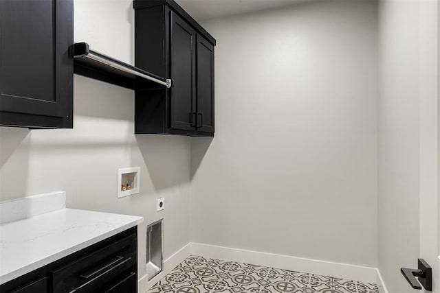 laundry area featuring cabinets, hookup for a washing machine, and electric dryer hookup