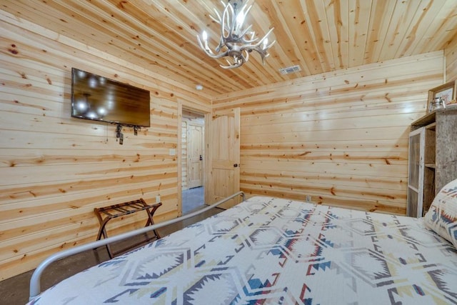 unfurnished bedroom featuring a chandelier, wooden walls, and wood ceiling