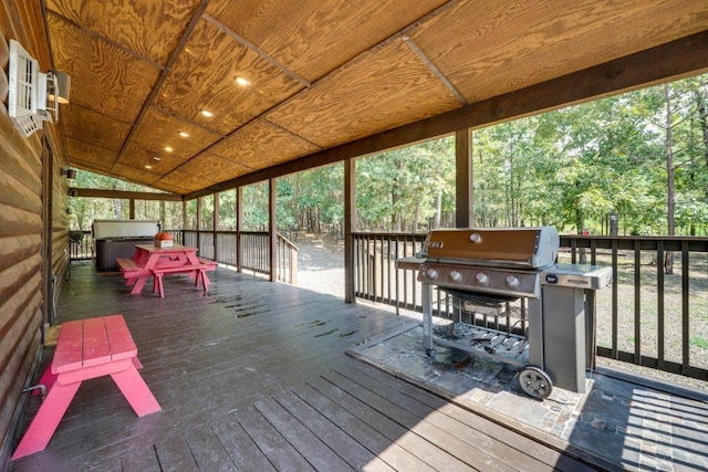 wooden deck featuring grilling area