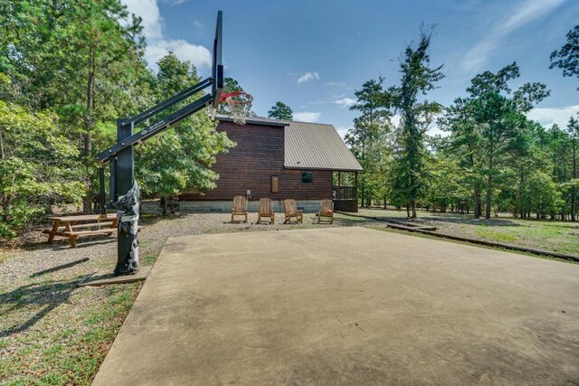 view of patio with basketball court