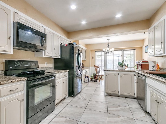 kitchen with pendant lighting, white cabinetry, a notable chandelier, and black appliances