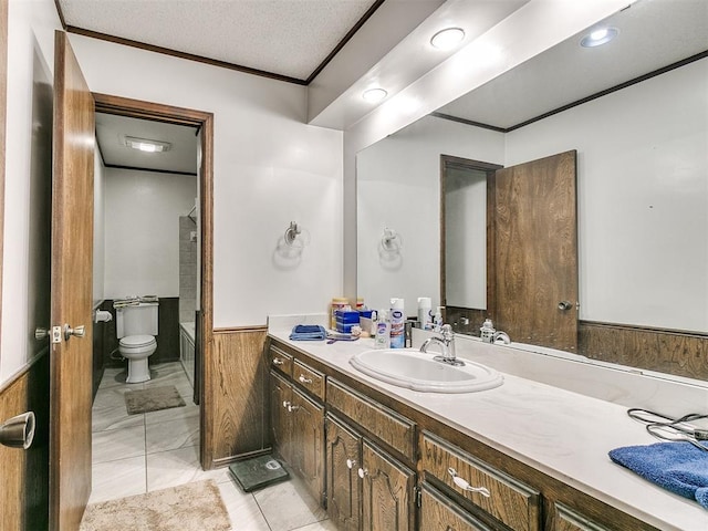 full bathroom with crown molding, a textured ceiling, toilet, vanity, and shower / bathtub combination