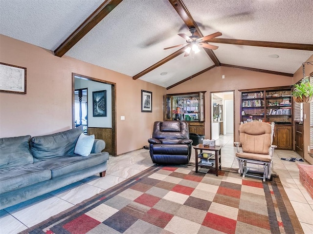 tiled living room featuring a textured ceiling, lofted ceiling with beams, ceiling fan, and a healthy amount of sunlight