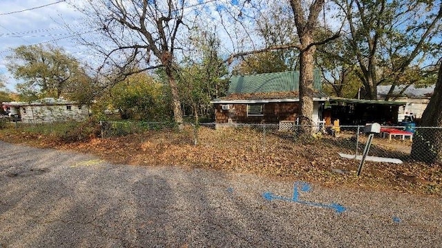 exterior space featuring a carport