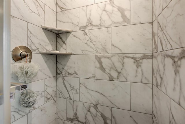 details with a tile shower