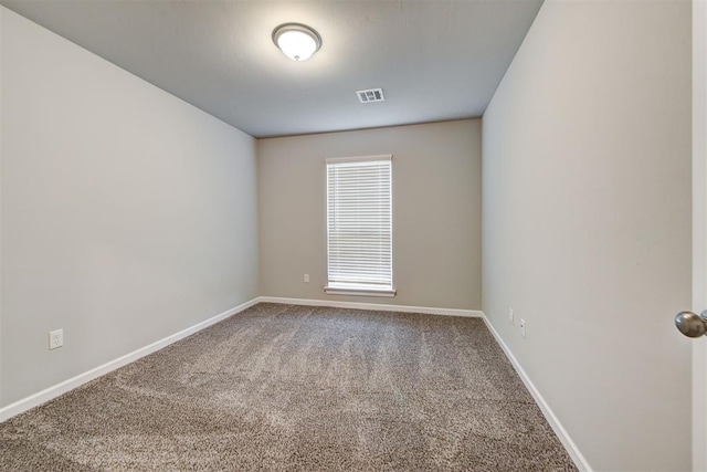 unfurnished room with carpet