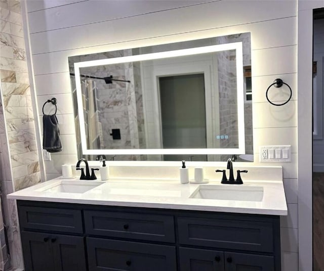 bathroom featuring vanity and walk in shower