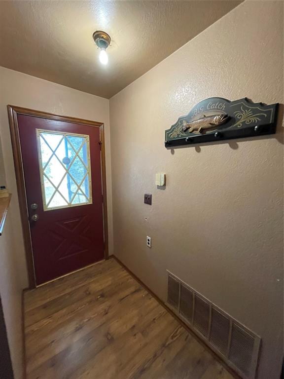 entryway featuring hardwood / wood-style floors