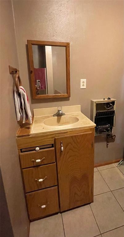 bathroom with tile patterned flooring and vanity