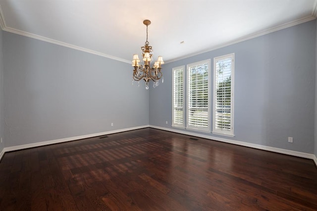 empty room with wood-type flooring, crown molding, and a notable chandelier