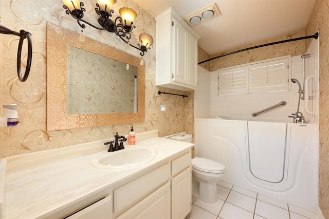 full bathroom with toilet, vanity, shower / bath combination, and tile patterned floors