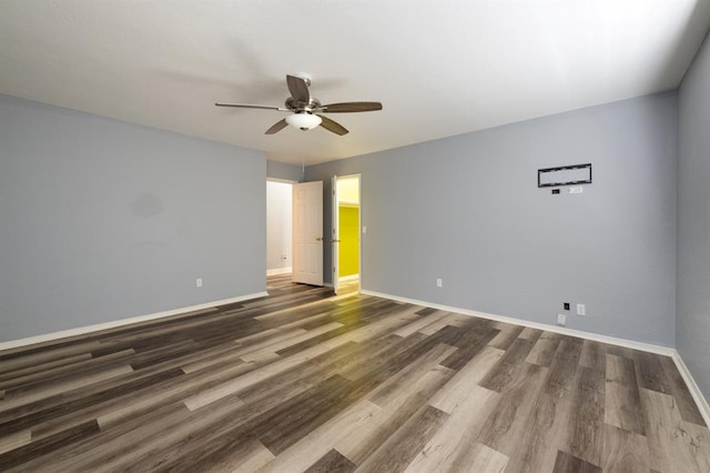 interior space featuring ceiling fan and dark hardwood / wood-style flooring