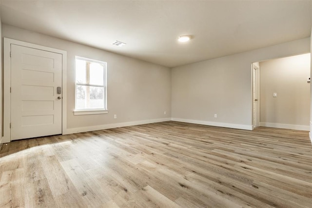 entrance foyer with light wood-type flooring