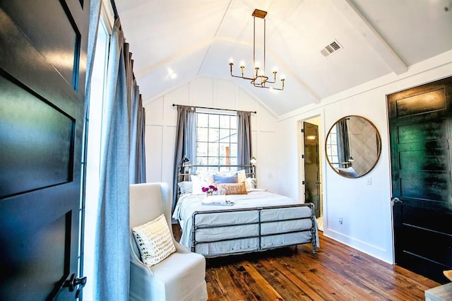 bedroom with a notable chandelier, dark wood-type flooring, and lofted ceiling with beams