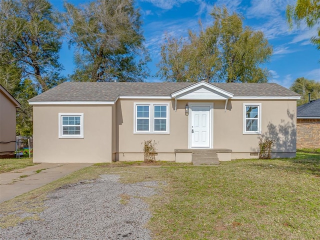 view of front of home with a front yard