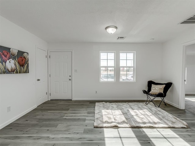 unfurnished room featuring light hardwood / wood-style flooring