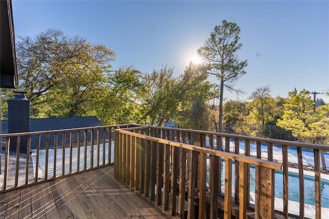 deck featuring a pool