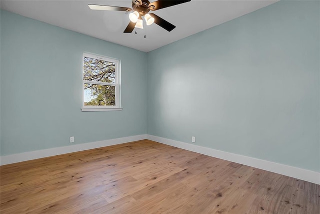 unfurnished room with ceiling fan and light hardwood / wood-style flooring