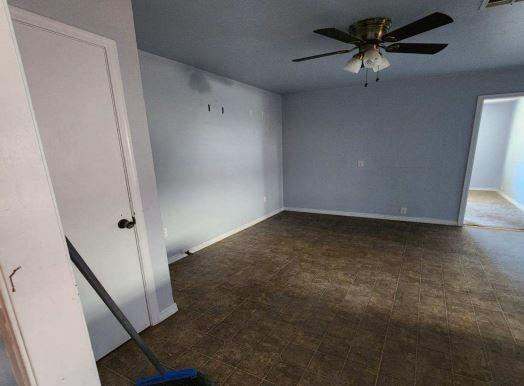 spare room featuring ceiling fan