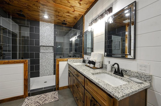 bathroom featuring vanity, wood ceiling, tile walls, and walk in shower