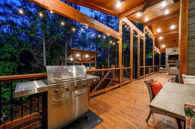 wooden deck featuring ceiling fan