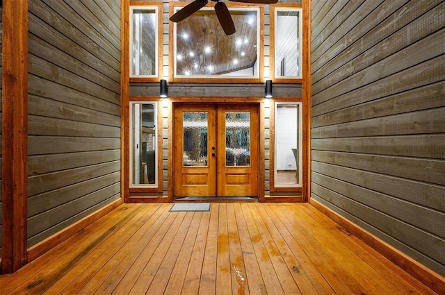 doorway to property with ceiling fan and french doors