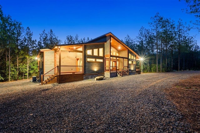 view of property exterior at dusk