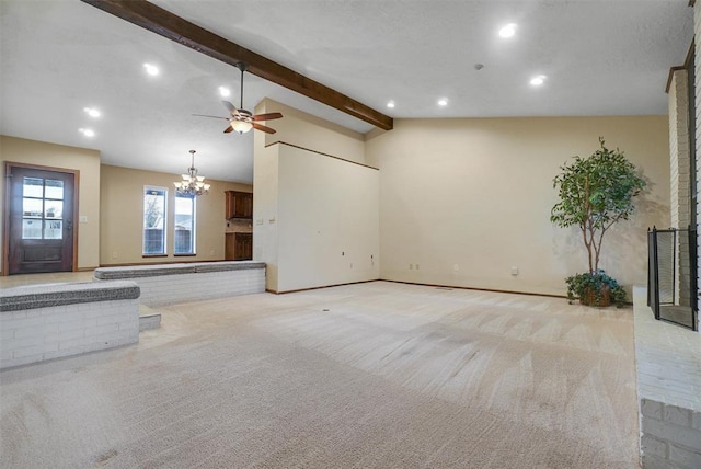 unfurnished living room featuring light carpet, vaulted ceiling with beams, and ceiling fan