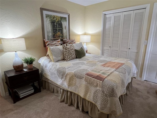 carpeted bedroom featuring a closet