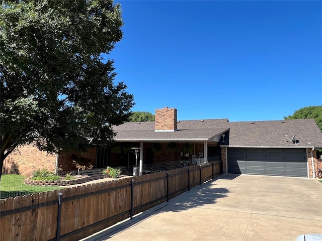 single story home with a garage