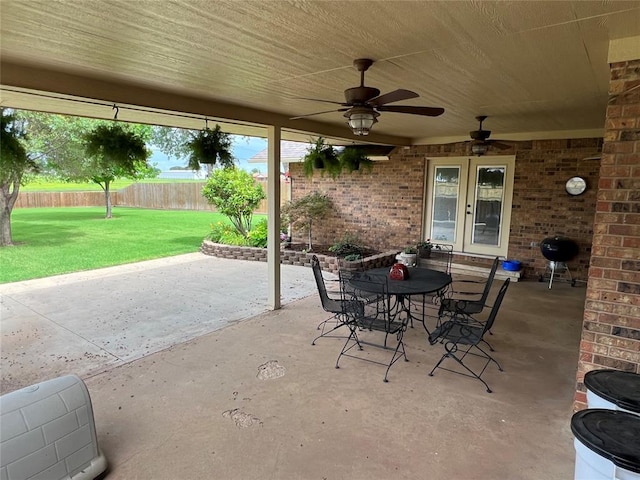 view of patio / terrace with ceiling fan and french doors