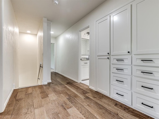 corridor featuring light wood-type flooring