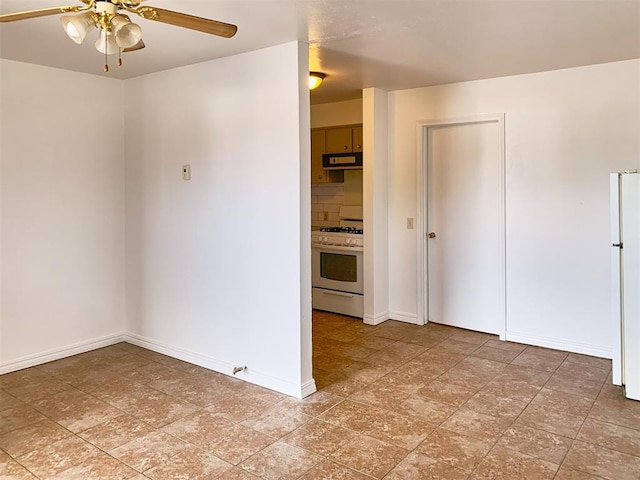 unfurnished room featuring ceiling fan