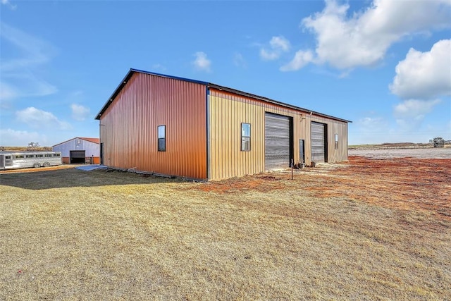 view of outdoor structure featuring a garage