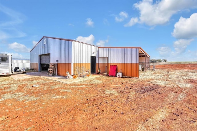 view of outdoor structure featuring a garage