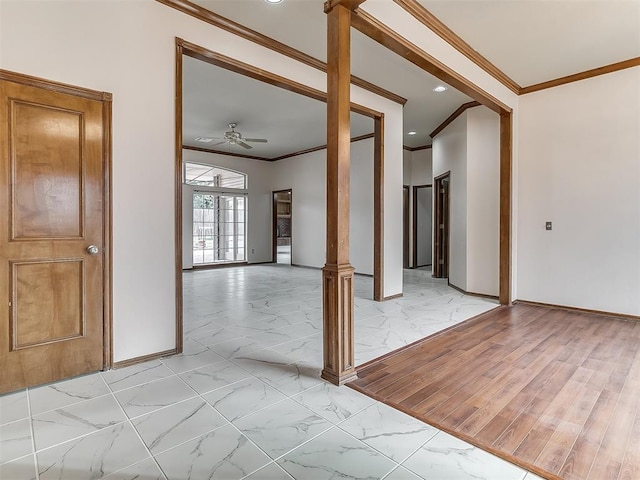 empty room with ceiling fan, ornamental molding, and light hardwood / wood-style flooring