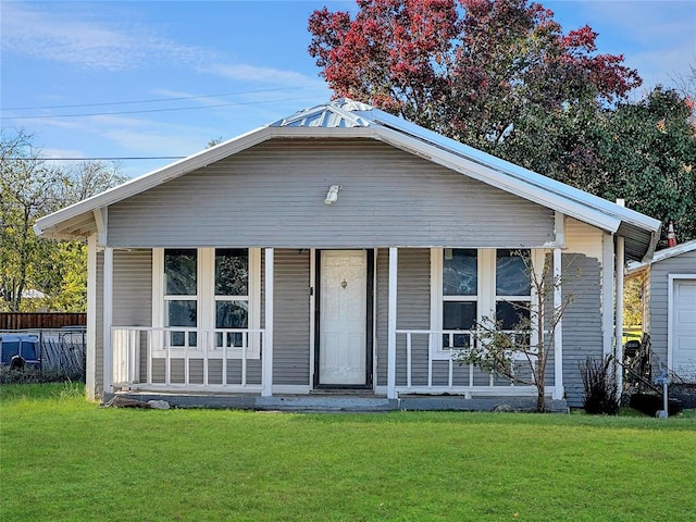 view of front of home featuring a porch and a front yard