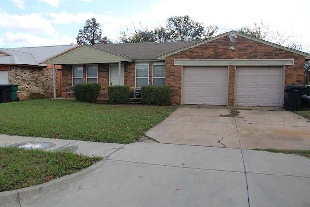 single story home featuring a front yard and a garage